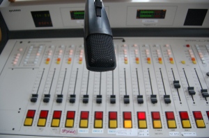Imagine you are standing in front of the music board for the radio station.